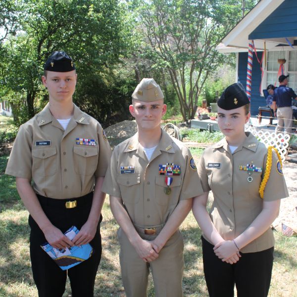  photo of three high school students in military uniforms